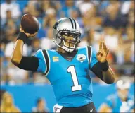  ?? Brian Blanco / Associated Press ?? Free-agent quarterbac­k Cam Newton is 31 and five years removed from his AP NFL MVP season, but he has been posting workout videos on Instagram to show he’s now healthy.