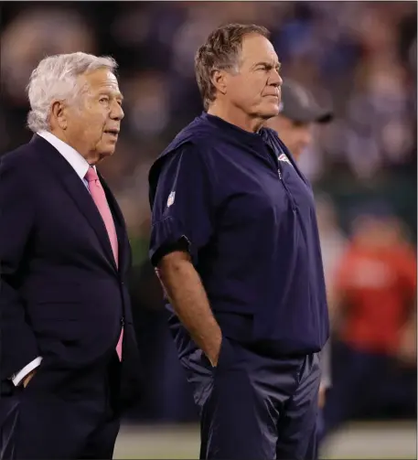  ?? ADAM HUNGER, AP ?? Robert Kraft and Bill Belichick have had many years of success together. But what about going forward? The team’s approach as free agency opened has been less than aggressive, disappoint­ing many fans.