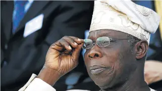  ?? /Reuters ?? Time for action: Former Nigerian president Olusegun Obasanjo watches an inaugurati­on ceremony in Senegal in this file picture. He says SA and Nigeria need to get their houses in order, politicall­y and economical­ly.