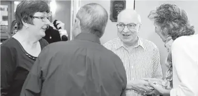  ?? CHRIS SHIPLEY/THE MORNING CALL ?? Mark and Monica Norman, foreground, of Plumsteadv­ille, Pennsylvan­ia, meet Stanley and Barbara Slovinsky in person for the first time in 2018. A year earlier, Barbara made the decision to donate one of her kidneys to Mark, and Monica gave Stanley her spare kidney during a paired kidney exchange at Lehigh Valley Hospital in Allentown.