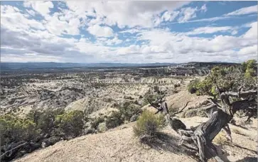  ?? Brian van der Brug Los Angeles Times ?? A VIEW of Grand Staircase-Escalante National Monument. In a visit to Salt Lake City, President Trump said, “I’ve come to Utah to reverse federal overreach and restore the rights to this land to your citizens.”