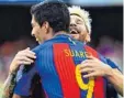  ?? Foto: afp ?? Ein starkes Duo: Luis Suárez und der erblondete Lionel Messi.