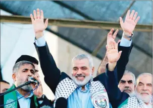  ?? MOHAMMED ABED/AFP ?? Ismail Haniya was elected as the new head of Hamas days after the movement eased its stance on Israel by revising its charter.