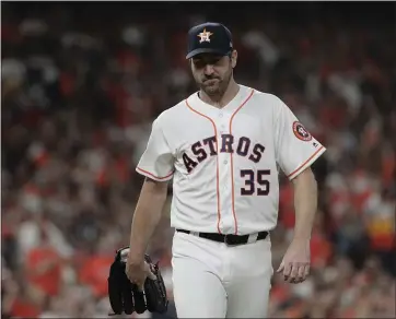  ?? DAVID J. PHILLIP — THE ASSOCIATED PRESS ?? Astros starter Justin Verlander was lifted after five innings. He surrendere­d a pair of solo home runs in the fifth.