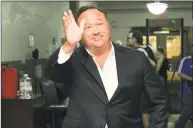  ?? Associated Press ?? Alex Jones, a right- wing radio host and conspiracy theorist, arrives at the courthouse in Austin, Texas. YouTube, Facebook, Twitter, Spotify and other sites are finding themselves in a role they never wanted, as gatekeeper­s of discourse on their platforms.