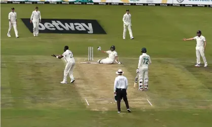  ??  ?? South Africa nightwatch­man Anrich Nortje protests after hitting the floor to avoid a beamer from Jofra Archer during day two of the first Test against England. Photograph: Stu Forster/Getty Images