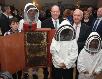  ??  ?? Prince Albert and Biodiversi­ty Forum organiser Philip McCabe with Philip’s grandchild­ren during the prince’s visit in 2017.