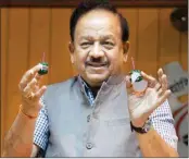  ?? PIC/MPOST ?? Minister for Science and Technology Harsh Vardhan launches a set of ‘green crackers’, at Anusandhan Bhawan in New Delhi on Saturday