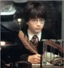  ??  ?? A young Daniel Radcliffe starts out as Harry Potter.