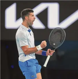  ?? Julian Finney/Getty Images ?? Novak Djokovic celebrates during a fourth-round singles match against Adrian Mannarino on Sunday.
