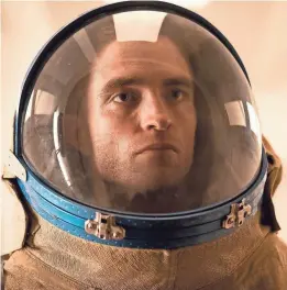  ?? MARTIN VALENTIN MENKE ?? In "High Life," astronaut Monte (Robert Pattinson) is the reluctant father of a young daughter, who becomes his reason to live.