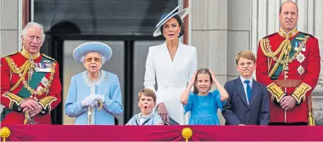  ?? ?? From left: The Prince of Wales, Queen Elizabeth II, Prince Louis, the Duchess of Cambridge, Princess Charlotte, Prince George and the Duke of Cambridge on the balcony of Buckingham Palace to view the flypast.