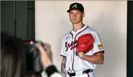  ?? HYOSUB SHIN/AJC ?? AJ Smith-Shawver is the Braves’ top prospect, and he said an emphasis for him has been on locating his pitches, particular­ly his off-speed stuff.