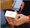  ??  ?? A new iphone X is sold at an Apple Store in Beijing, China. — Reuters