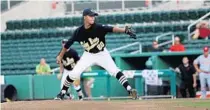  ?? KELLI KREBS/SPECIAL TO THE SENTINEL ?? Former Bishop Moore pitcher Josh Bates winds up for a pitch during an FHSAA state semifinal baseball game in May 2016 in Fort Myers.