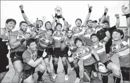  ??  ?? The victorious Japanese team, who fought back gallantly to record a close 14 - 12 win over Hong Kong.