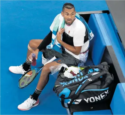  ?? Photo / AP ?? Nick Kyrgios complained of a sore knee during his first-round loss to Milos Raonic.