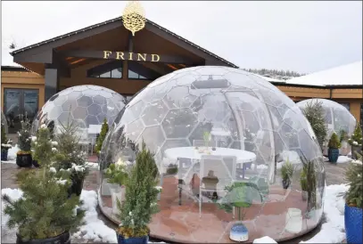  ?? To the Westside Weekly ?? STEVE MacNAULL/Special
Frind Winery in West Kelowna has 10 outdoor dining domes on its patio for the winter for dining and high tea.