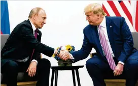  ?? THE NEW YORK TIMES ?? The informant was instrument­al to the CIA’s conclusion that Russia’s interferen­ce campaign was ordered by Russian President Vladimir Putin (left).