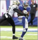  ?? JOHN BLAINE — FOR THE TRENTONIAN ?? Giants receiver Sterling Shepard, right, makes a catch while being covered by Saints defensive back De’Vante Harris.