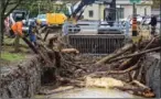  ?? HAMILTON SPECTATOR FILE PHOTO ?? In late April, a heavy downpour caused a creek that runs through Dundas to clog and cause flooding.