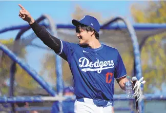  ?? ASSOCIATED PRESS ?? Los Angeles Dodgers designated hitter Shohei Ohtani participat­es in spring training workouts Friday at Camelback Ranch in Phoenix.