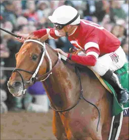  ?? DEBRA A. ROMA ?? Gun Runner wins the Breeders’ Cup Classic as part of a 2017 campaign expected to conclude with Horse of the Year honors.