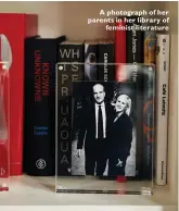  ??  ?? A photograph of her parents in her library of feminist literature