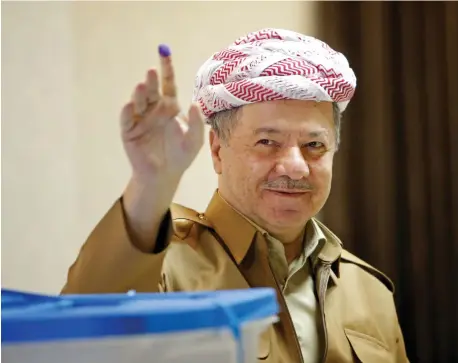  ?? (Photos: Reuters) ?? KURDISTAN DEMOCRATIC Party leader Masoud Barzani shows his ink-stained finger after casting his vote during parliament­ary elections in the semi-autonomous region on the outskirts of Erbil, Iraq, on September 30.