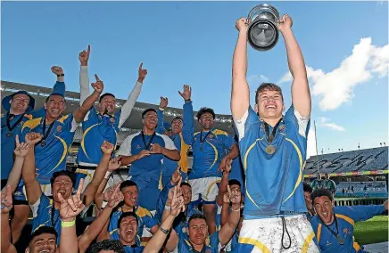  ?? GETTY IMAGES ?? Niko Jones and his St Peter’s College team-mates celebrate winning the Auckland 1A title earlier this year.