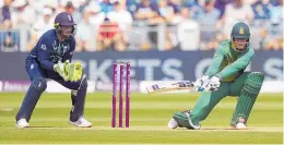  ?? Photo / AP ?? Rassie van der Dussen scored a match-winning century for South Africa.