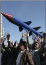  ?? (AP/Osamah Abdulrahma­n) ?? Houthi supporters attend a rally Friday in support of the Palestinia­ns in the Gaza Strip and against the U.S.-led airstrikes on Yemen, in Sanaa, Yemen.