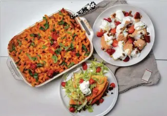  ?? HUNT FOR THE AJC STYLING BY KATE WILLIAMS / CHRIS ?? Tiktok exposure helped us bring you these recipes: (clockwise starting at top left) Baked Feta Pasta, Cloud Bread with Strawberri­es and Cream, and Crunchwrap Tortilla Hack.