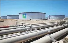  ?? Reuters ?? Tanks and pipelines at Saudi Aramco’s Ras Tanura refinery in Saudi Arabia. While Saudi Aramco’s decision surprised the market, a proposal to switch benchmarks has been discussed internally for years.