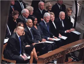  ?? JACK GRUBER/USA TODAY ?? United in this if nothing else, the Trumps, Obamas, Clintons and Carters gathered to honor George H.W. Bush.