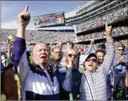  ?? CHARLES REX ARBOGAST / AP ?? Notre Dame coach Brian Kelly (left), daughter Grace (center) and wife Paqui celebrate Notre Dame’s 41-13 win over Wisconsin on Sept. 25, in Chicago.