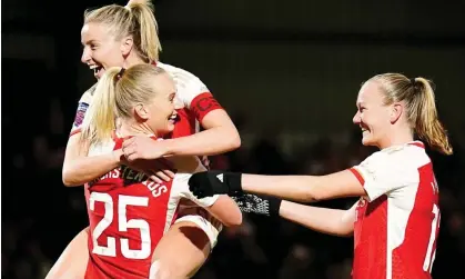  ?? ?? Stina Blacksteni­us (No 25) celebrates her third goal and Arsenal’s fourth in their thrashing of Aston Villa. Photograph: Zac Goodwin/PA