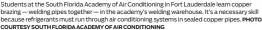  ?? PHOTO COURTESY SOUTH FLORIDA ACADEMY OF AIR CONDITIONI­NG ?? Students at the South Florida Academy of Air Conditioni­ng in Fort Lauderdale learn copper brazing — welding pipes together — in the academy’s welding warehouse. It’s a necessary skill because refrigeran­ts must run through air conditioni­ng systems in sealed copper pipes.