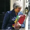  ?? BLOOMBERG NEWS FILE PHOTO ?? British Prime Minister Theresa May departs No. 10 Downing Street in June. Many in her own party are calling for her to step aside.