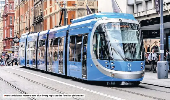 ??  ?? > West Midlands Metro’s new blue livery replaces the familiar pink trams