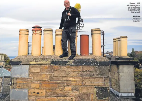  ?? Picture Andrew Cawley ?? Sweep Kirk McLeneghan on a rooftop in Edinburgh
last week