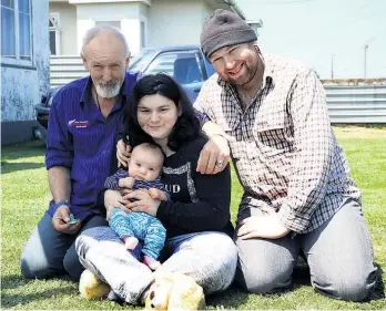  ?? Picture / Stuart Munro ?? Grandfathe­r Brian Maisey (left) and dad Laurence Maisey (right) make sure one of them is always with baby Charlie and his mum Freyja (centre) in case she has a seizure.