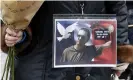  ??  ?? A woman holds a picture of Samuel Paty during a rally in Lille on Sunday. Photograph: François Lo Presti/AFP/Getty Images