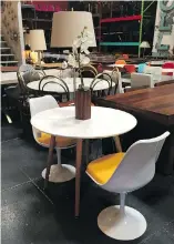  ??  ?? A retro white table and chairs set from Ebee Martinez’s Los Angeles store Sunbeam Vintage.