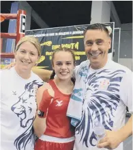  ?? ?? Holly Heffron with England coaches Amanda Coulson and Mike Driscoll