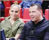  ?? (AP) ?? In this Dec 13, 2019 file photo, Jennifer Lopez, (left), and Alex Rodriguez sit courtside during an NBA basketball game between the Miami Heat and the Los Angeles Lakers in Miami.