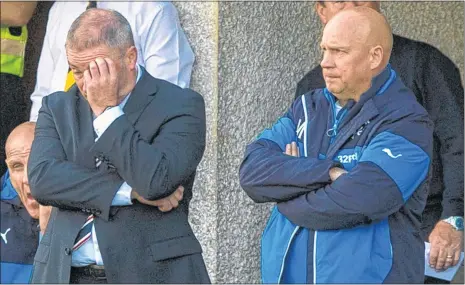  ??  ?? Ally McCoist and assistant Kenny McDowell sometimes look through the cracks in their fingers at Rangers’ performanc­es