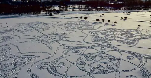 ??  ?? ABOVE: The ‘snow circle’ made entirely of footprints at Espoo, Finland. The artwork measures 160m (525ft) in diameter and was created by a team of 13 volunteers.
