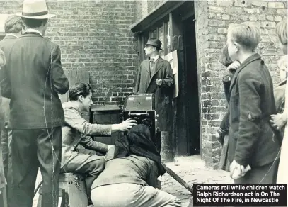  ??  ?? Cameras roll while children watch Ralph Richardson act in On The Night Of The Fire, in Newcastle