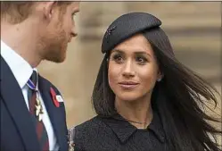  ??  ?? Meghan Markle (à dr.) et le prince Harry, le 25 avril à Londres.